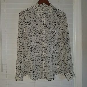 Long sleeve button up top with sunglasses pattern